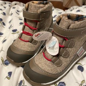 See Kai run size 10 waterproof boots. NWT. Tan with red laces.